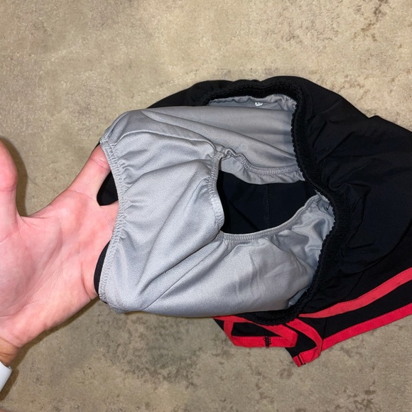 Black Nike shorts with red trim - Picture 4 of 5